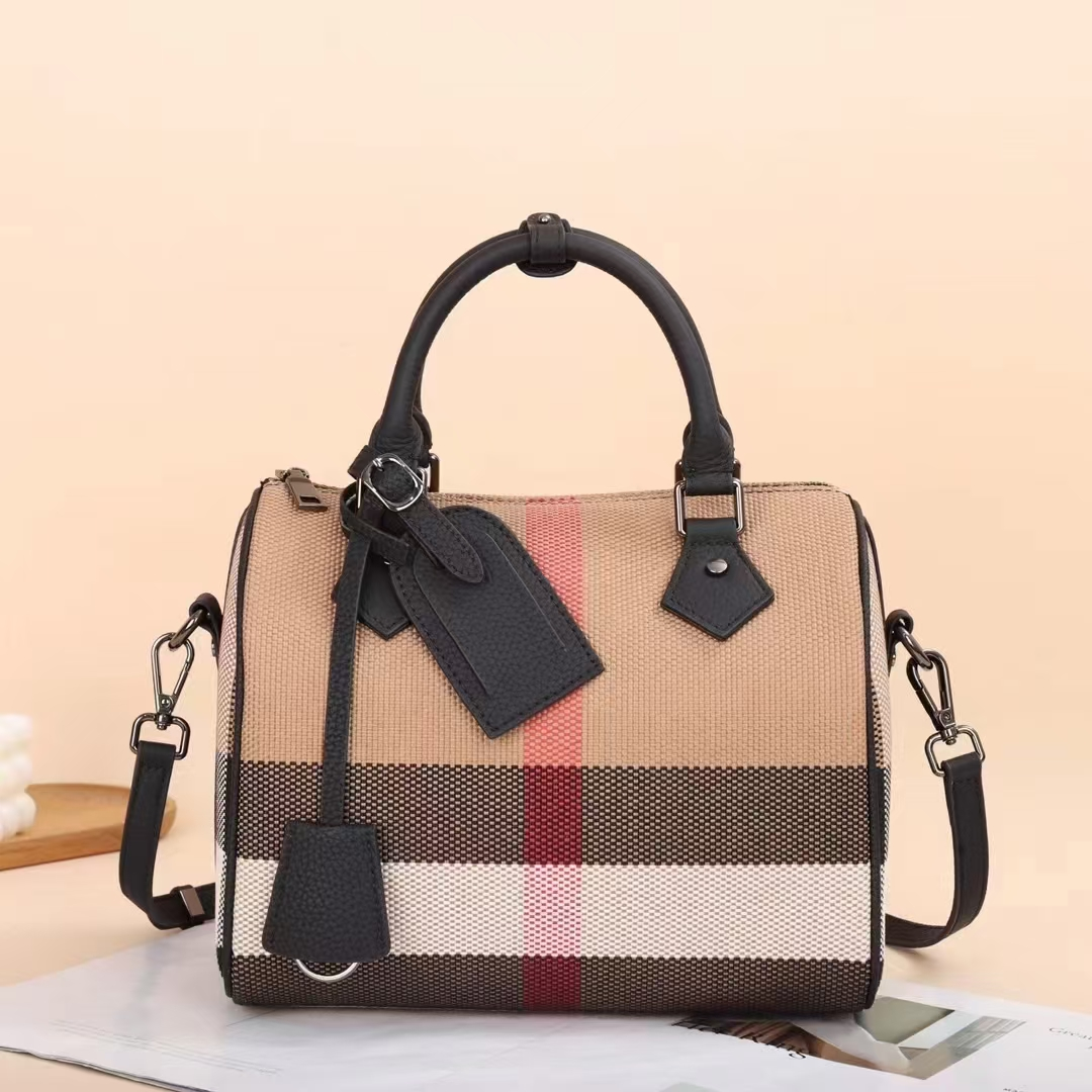 Street trend niche design genuine leather women's bag new high-end plaid bag canvas and cowhide bag hand-held pillow bag women's bag